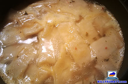 Faux chicken and dumplings simmering on my stovetop. The only ingredients are flour, water, a few spices and SHEER FORCE OF WILL (© 2013 Billy Suratt)